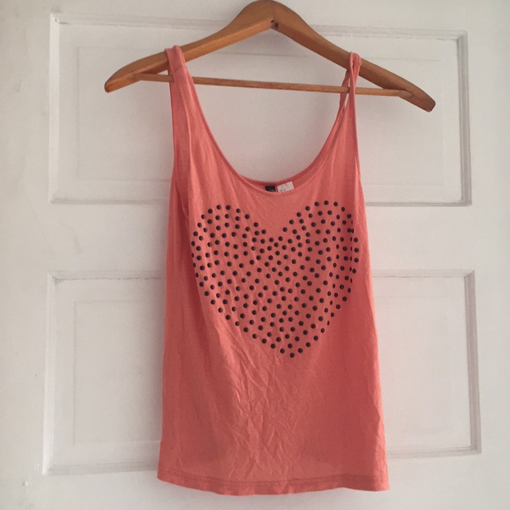 Orange shirt with black heart with beeds